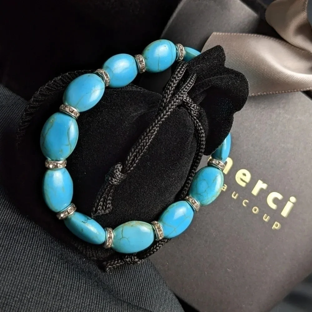 Pretty faux turquoise color beaded bracelet with CZ, oblong shape beads